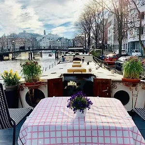 Romantic Houseboat Couette-café